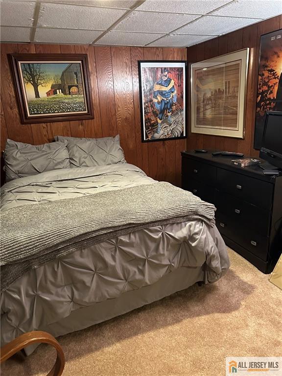 5 Serviss Ave, East Brunswick, NJ 08816 - carpeted bedroom with wood walls
