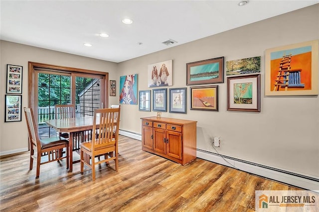 5 Serviss Ave, East Brunswick, NJ 08816 - dining space featuring baseboard heating, light wood-type flooring, and recessed lighting