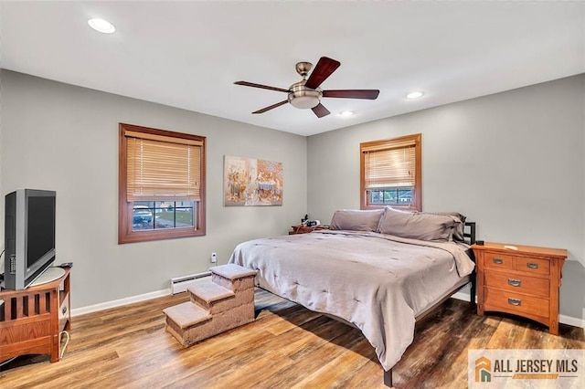 5 Serviss Ave, East Brunswick, NJ 08816 - bedroom featuring a baseboard radiator, wood finished floors, recessed lighting, and a ceiling fan