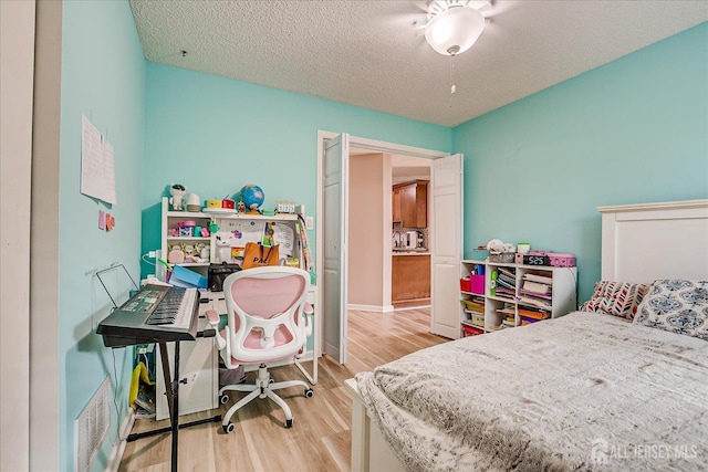 19 Carriage Pl, Edison, NJ 08820 - bedroom with wood finished floors and a textured ceiling