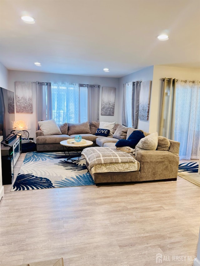 45 Marina View Dr, Sewaren, NJ 07077 - living room with wood finished floors and recessed lighting