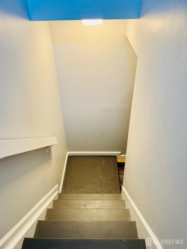 45 Marina View Dr, Sewaren, NJ 07077 - staircase featuring baseboards