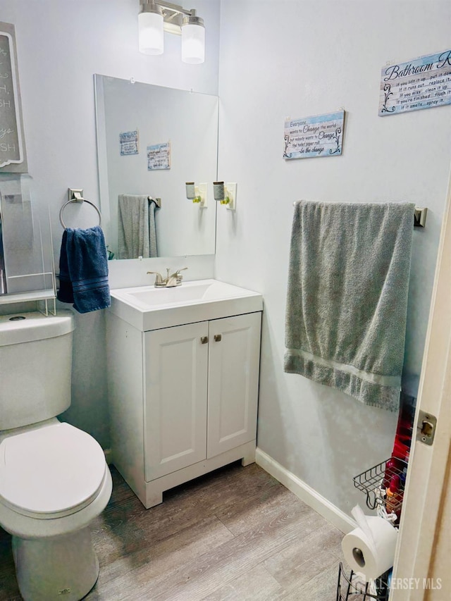 45 Marina View Dr, Sewaren, NJ 07077 - half bathroom featuring wood finished floors and vanity
