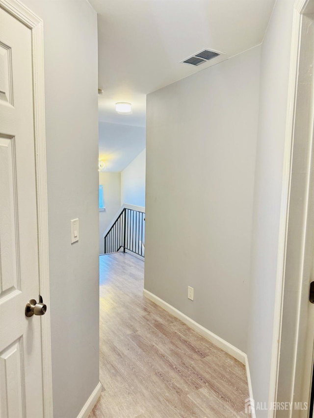 45 Marina View Dr, Sewaren, NJ 07077 - corridor with an upstairs landing and light wood-type flooring