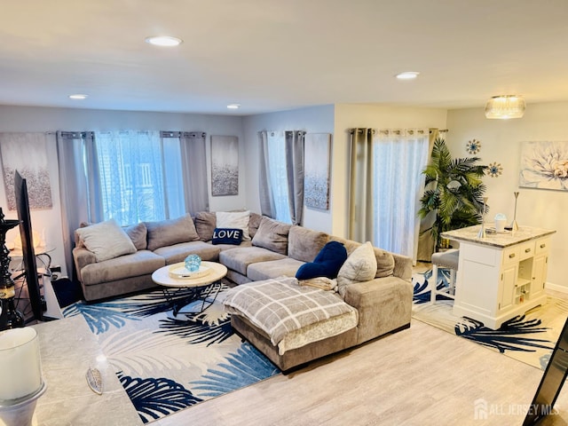 45 Marina View Dr, Sewaren, NJ 07077 - living area featuring healthy amount of natural light, recessed lighting, and wood finished floors