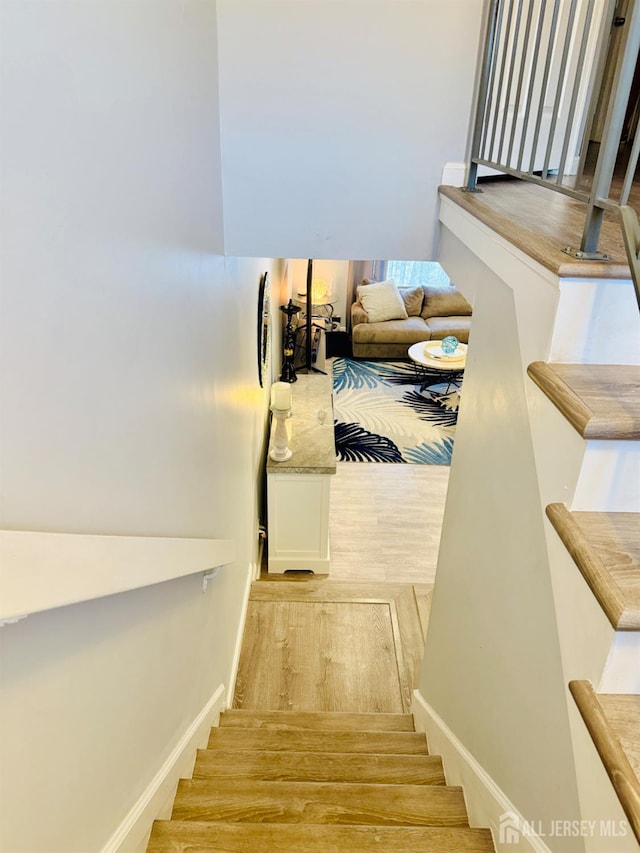 45 Marina View Dr, Sewaren, NJ 07077 - staircase with wood finished floors