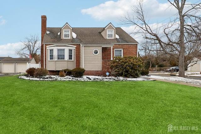 cape cod home with brick siding, roof with shingles, a chimney, a garage, and a front lawn