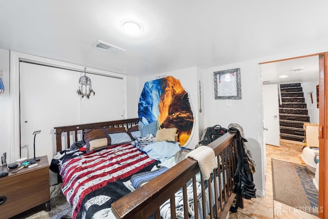 bedroom featuring visible vents