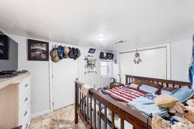 bedroom featuring visible vents