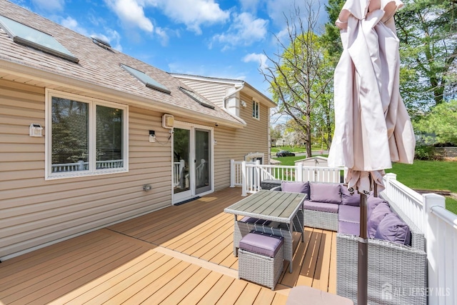 deck featuring an outdoor hangout area