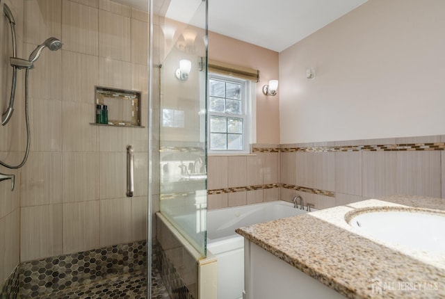 1565 W 6th St, Piscataway, NJ 08854 - full bathroom featuring vanity, a garden tub, and a stall shower