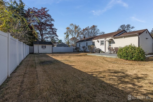 1565 W 6th St, Piscataway, NJ 08854 - rear view of property with a patio, a shed, and a fenced backyard