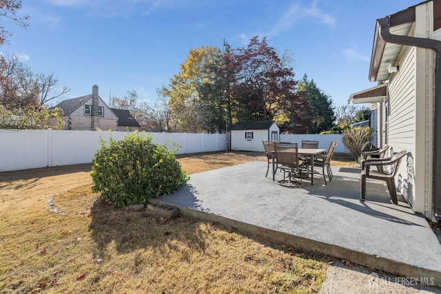 1565 W 6th St, Piscataway, NJ 08854 - fenced backyard featuring a shed, a patio, and outdoor dining space