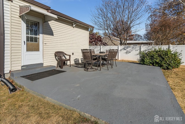 1565 W 6th St, Piscataway, NJ 08854 - fenced backyard with outdoor dining area and a patio area