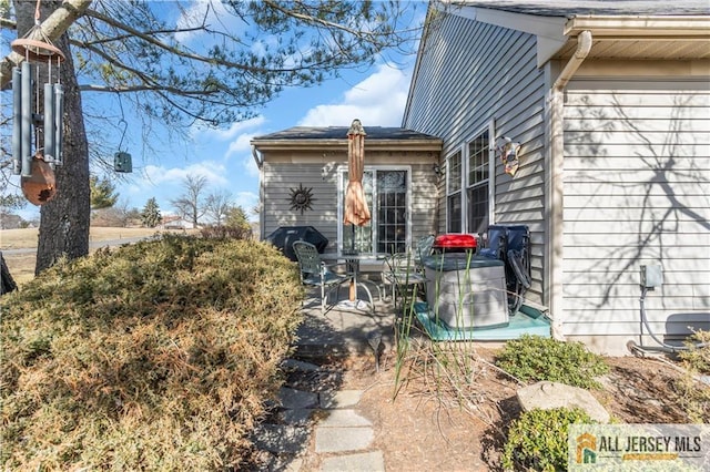 view of home's exterior featuring a patio