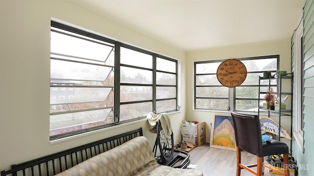 office space with a wealth of natural light and wood finished floors