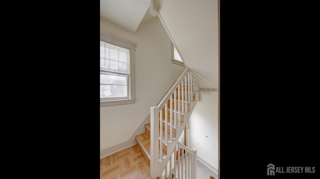 stairway with baseboards