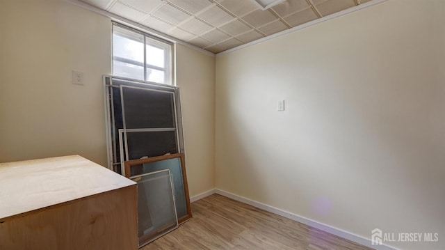 interior space with baseboards and light wood-type flooring