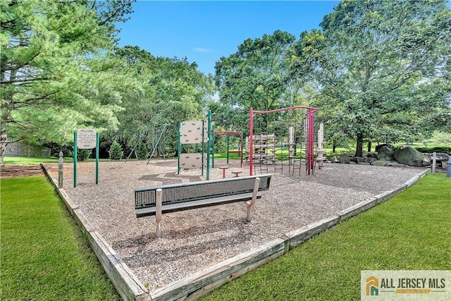 community jungle gym featuring a lawn