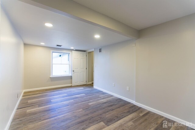 empty room featuring hardwood / wood-style floors