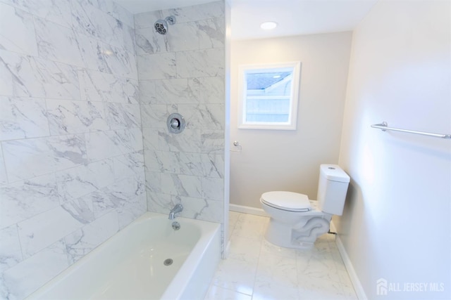 bathroom with washtub / shower combination, marble finish floor, toilet, and baseboards