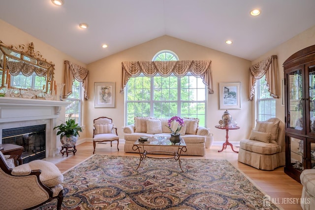 16 Baltusrol Ct, Monroe, NJ 08831 - living room with lofted ceiling, recessed lighting, a fireplace, wood finished floors, and baseboards