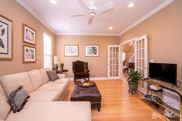 16 Baltusrol Ct, Monroe, NJ 08831 - living room featuring light wood-style floors, french doors, ornamental molding, recessed lighting, and baseboards