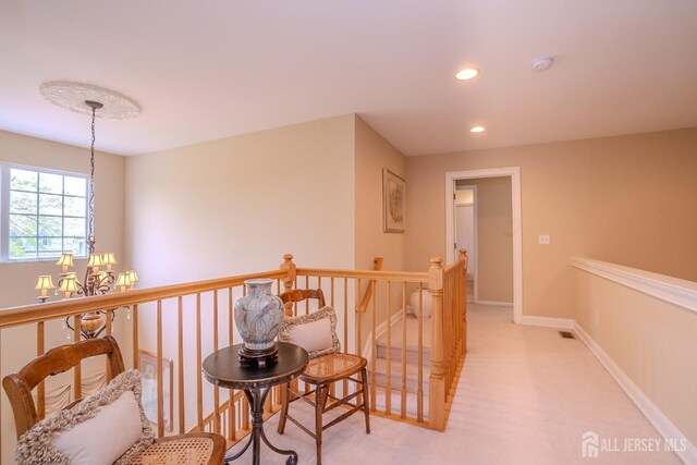 16 Baltusrol Ct, Monroe, NJ 08831 - hall with a chandelier, recessed lighting, an upstairs landing, light colored carpet, and baseboards
