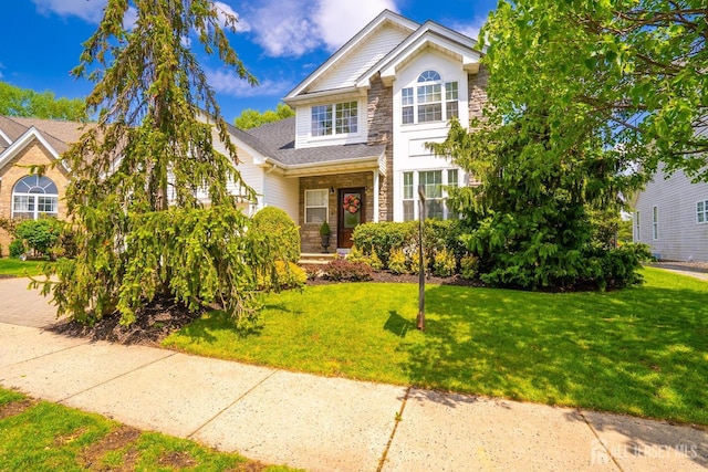 16 Baltusrol Ct, Monroe, NJ 08831 - traditional home featuring stone siding and a front yard