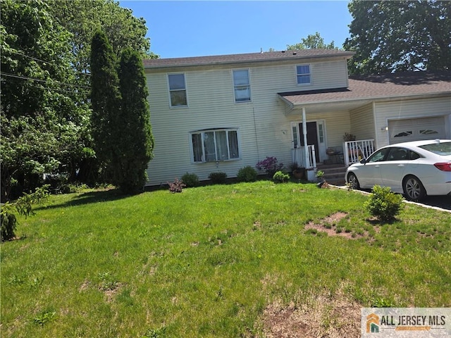 518 Wheeler Pl, Franklin, NJ 08873 - view of front of house with an attached garage and a front yard