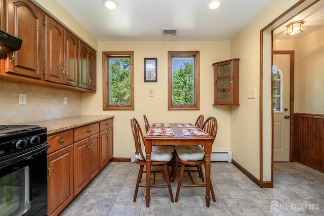 22 Roosevelt St, Pequannock, NJ 07440 - dining room with recessed lighting, baseboards, and a baseboard radiator