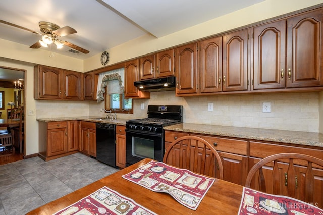 22 Roosevelt St, Pequannock, NJ 07440 - kitchen with black appliances, under cabinet range hood, ceiling fan, backsplash, and brown cabinets