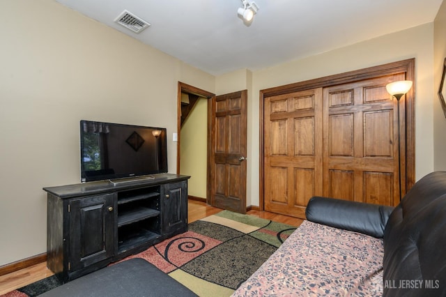 22 Roosevelt St, Pequannock, NJ 07440 - living area with light wood-style floors and baseboards