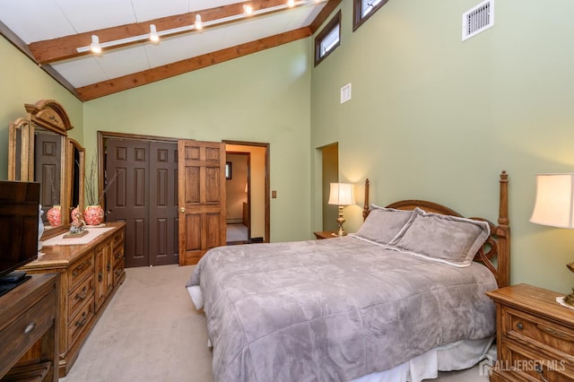 22 Roosevelt St, Pequannock, NJ 07440 - bedroom featuring light carpet, high vaulted ceiling, a closet, and beamed ceiling