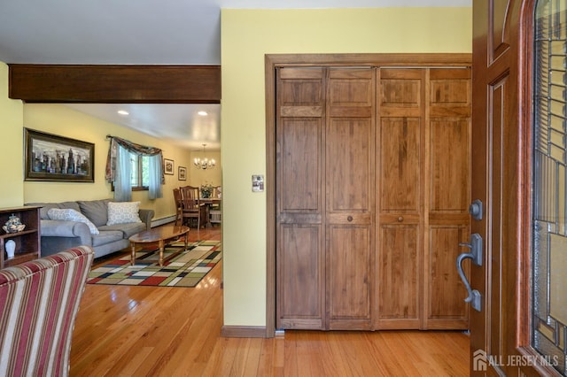 22 Roosevelt St, Pequannock, NJ 07440 - entrance foyer featuring light wood-style floors, a chandelier, beamed ceiling, recessed lighting, and baseboards