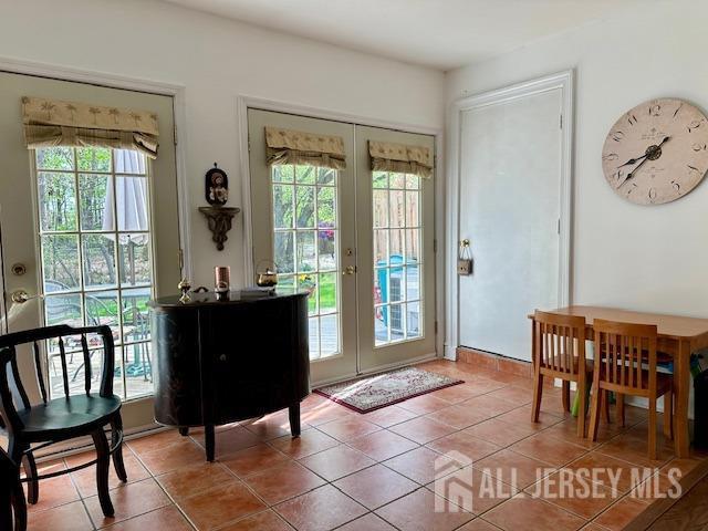 271 Constitution Cir, North Brunswick, NJ 08902 - doorway featuring french doors and tile patterned floors