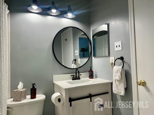 271 Constitution Cir, North Brunswick, NJ 08902 - bathroom featuring toilet and vanity