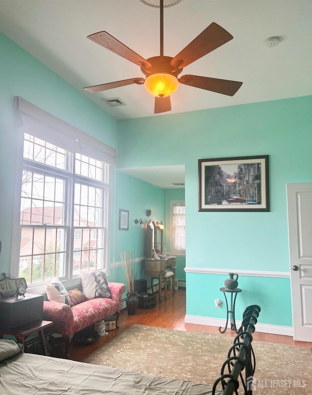121 Beech St, Fords, NJ 08863 - bedroom with wood finished floors, a ceiling fan, and baseboards