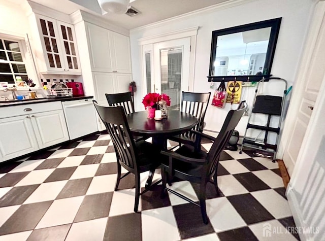 121 Beech St, Fords, NJ 08863 - dining space with dark floors and crown molding