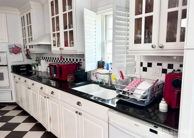 121 Beech St, Fords, NJ 08863 - kitchen with a sink, tasteful backsplash, light flooring, a warming drawer, and white cabinets