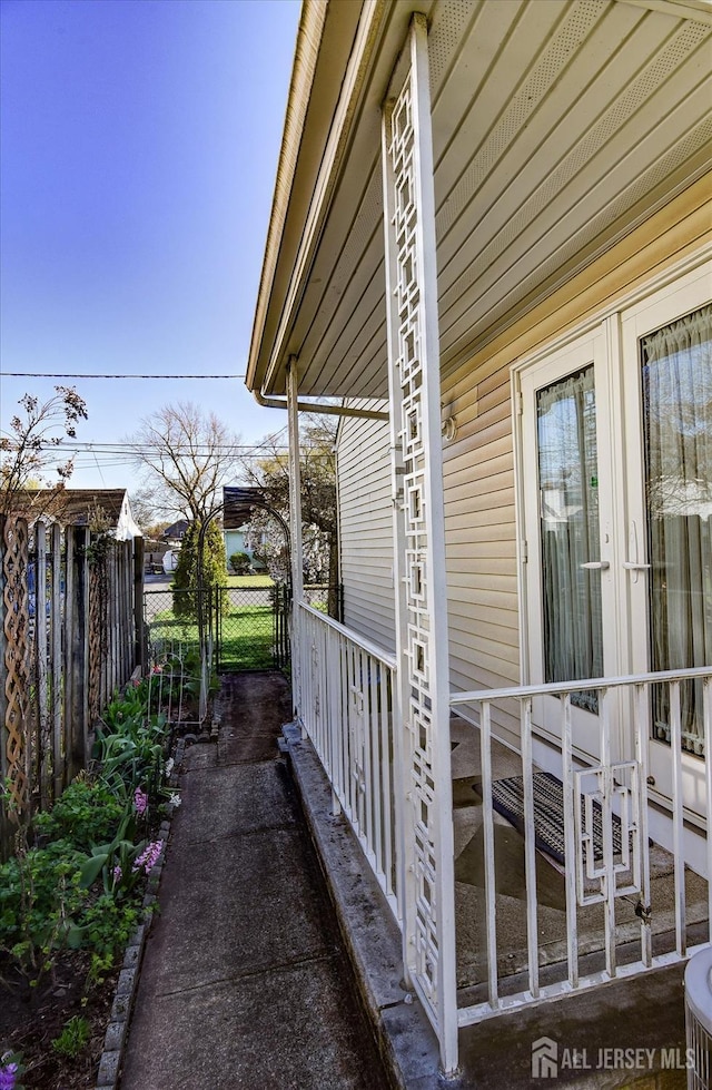 view of home's exterior featuring fence