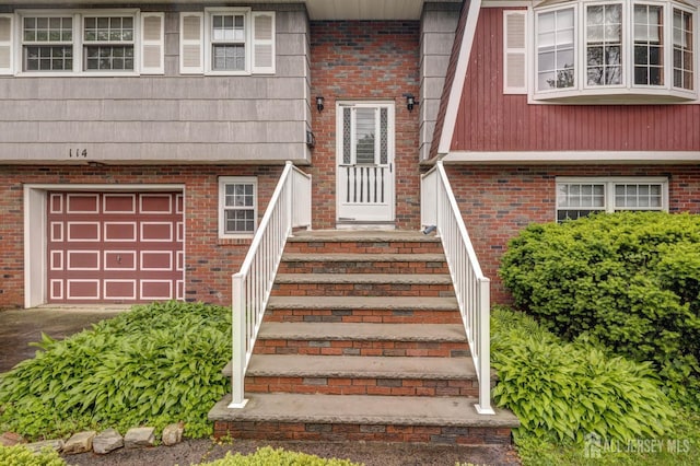114 Redwood Ave, Edison, NJ 08817 - property entrance with a garage and brick siding