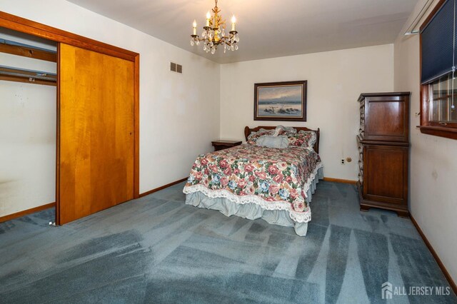 114 Redwood Ave, Edison, NJ 08817 - carpeted bedroom with a chandelier and baseboards