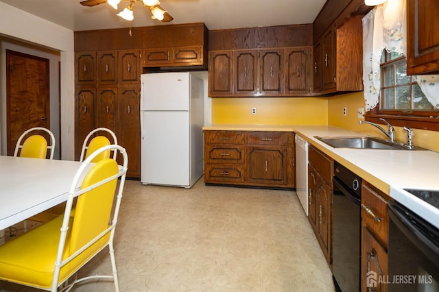 114 Redwood Ave, Edison, NJ 08817 - kitchen featuring white appliances, light floors, a sink, and light countertops
