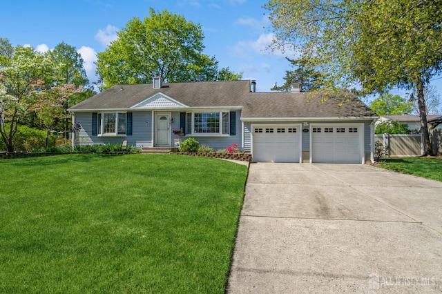 1430 Seneca Rd, North Brunswick, NJ 08902 - view of front of home featuring an attached garage, a chimney, and concrete driveway