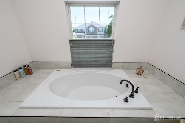 bathroom featuring a bath