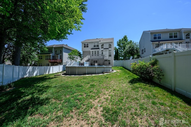 view of yard featuring stairs