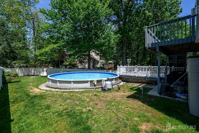 view of pool featuring a wooden deck