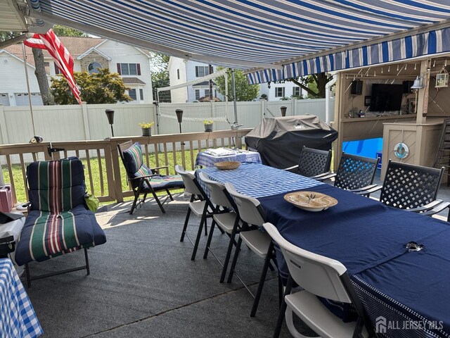 view of patio / terrace with a fenced backyard and area for grilling