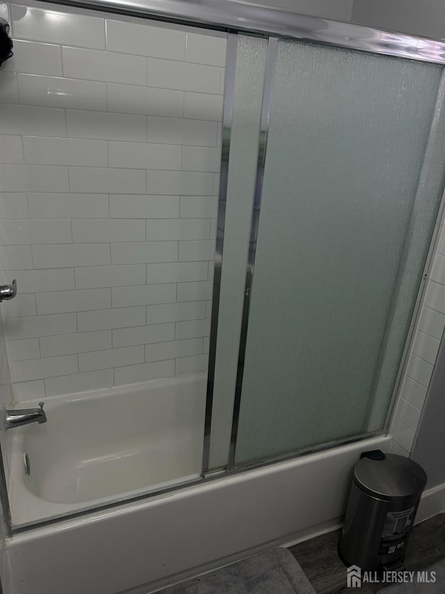 262 Hale St, New Brunswick, NJ 08901 - bathroom featuring bath / shower combo with glass door